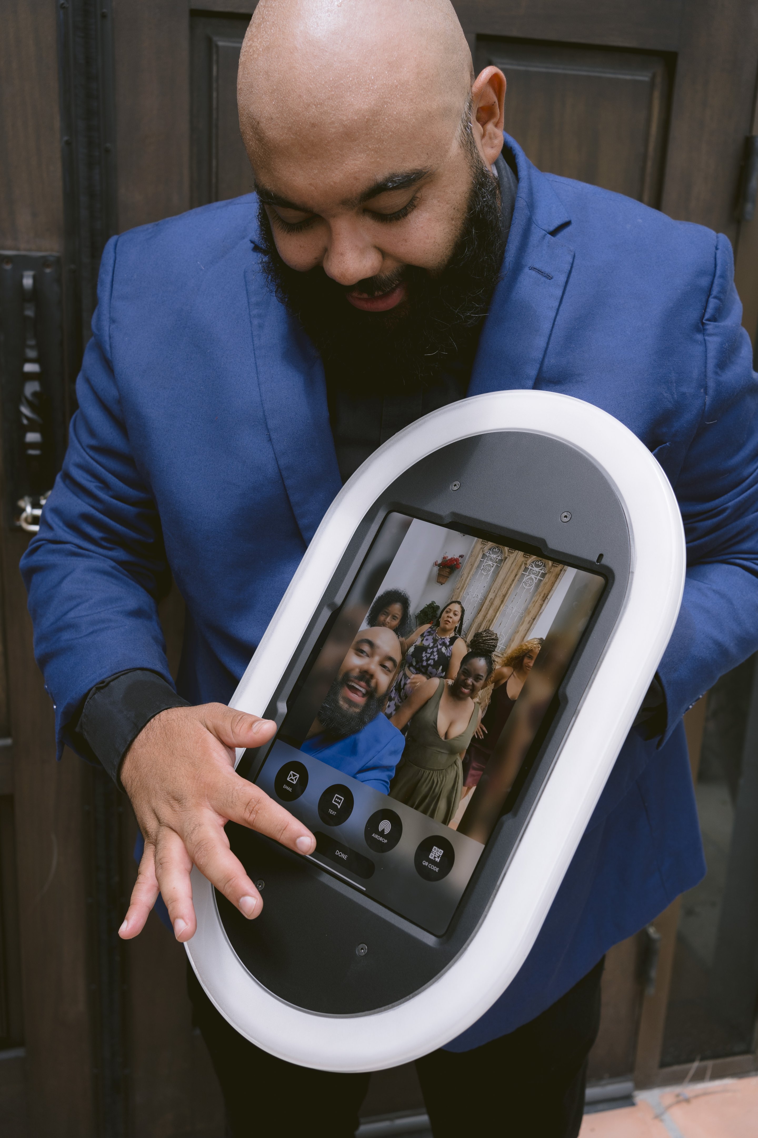 The roaming photo booth carried out to guests, their photo on the screen
